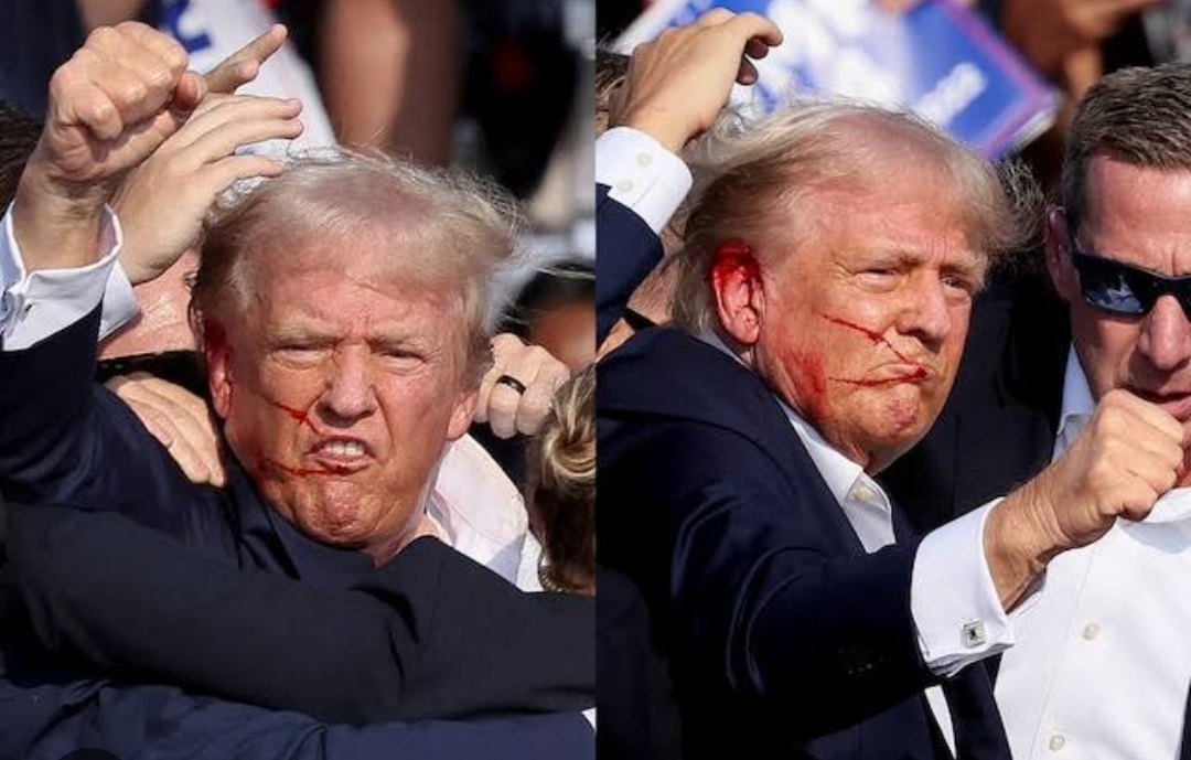 Trump grabs his neck, falls after shots fired at Butler, Pennsylvania rally